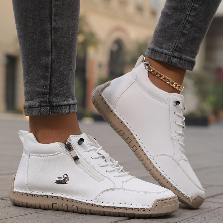 Women's ankle trainers in white, lace up high top stitched