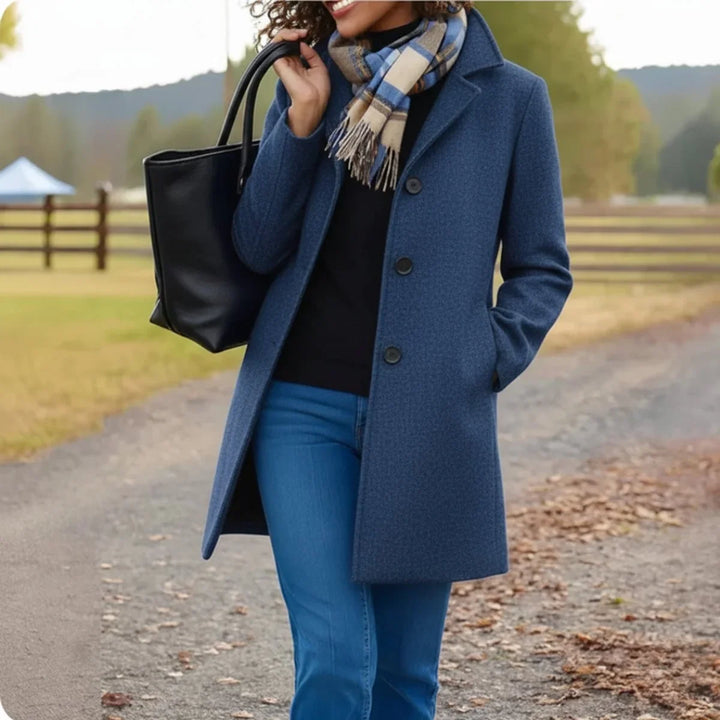 Women's single breasted coat in blue, mid length notch collar tailored