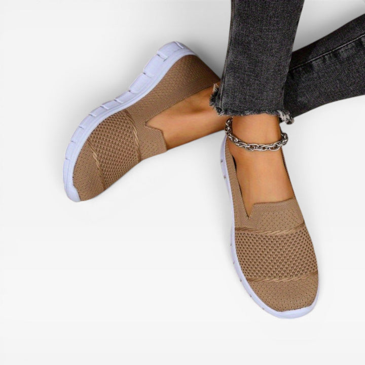 Camel knit trainers seen from above, showing the open mesh toe