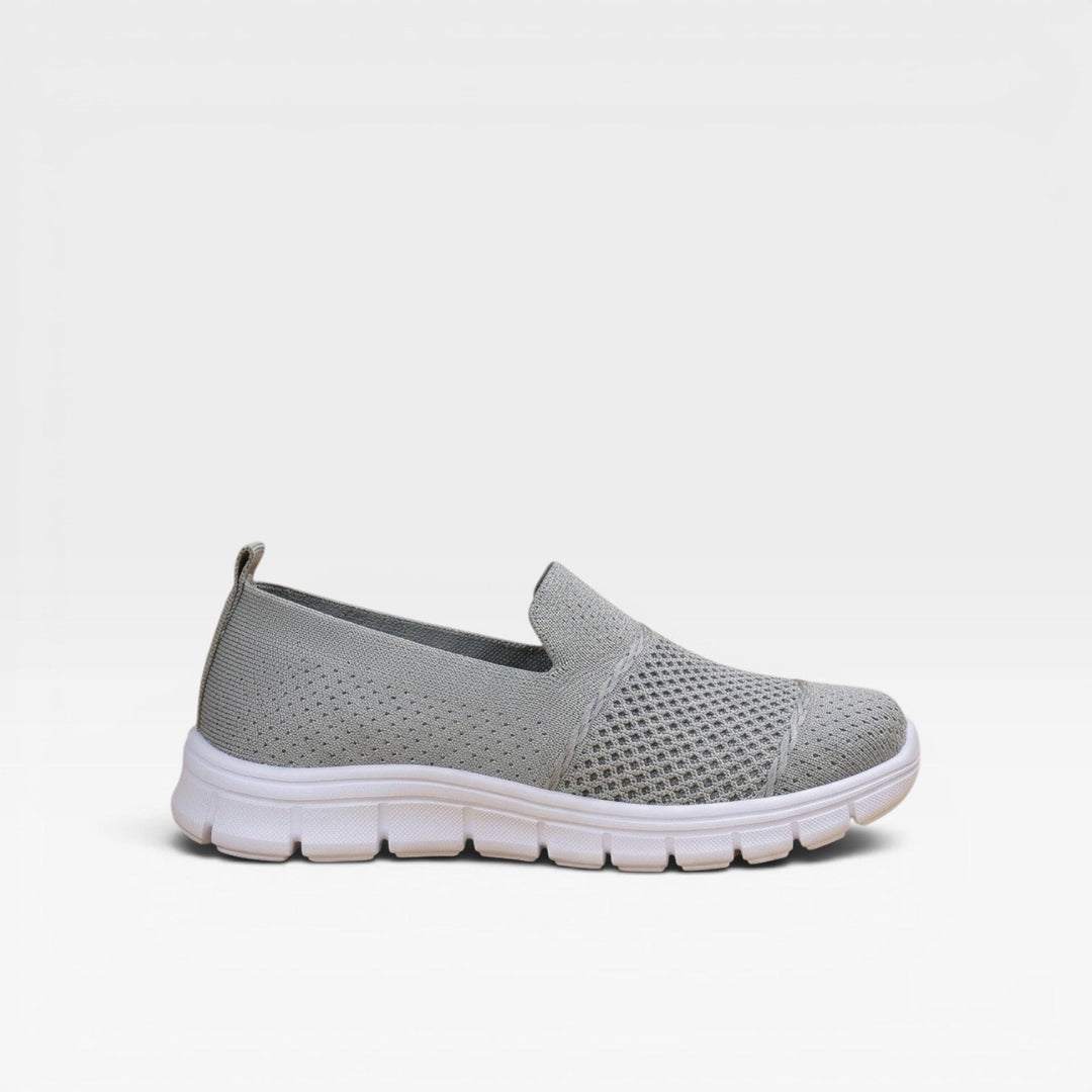 Grey slip on knit trainers with a soft stretch collar