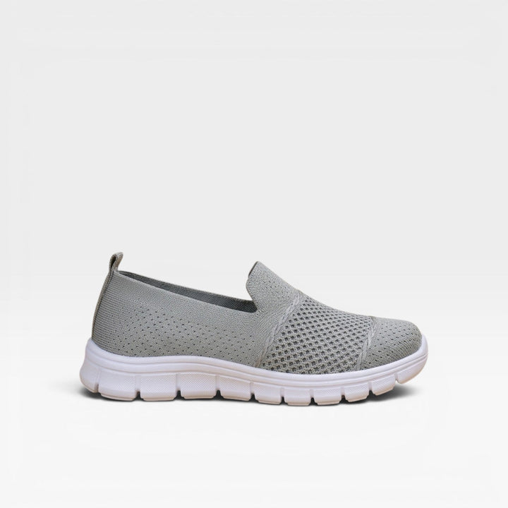 Grey slip on knit trainers with a soft stretch collar
