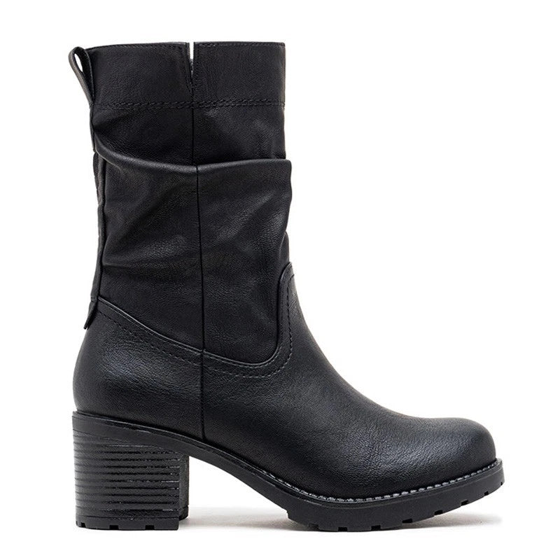 Black slouch boots, three quarter view on a plain background