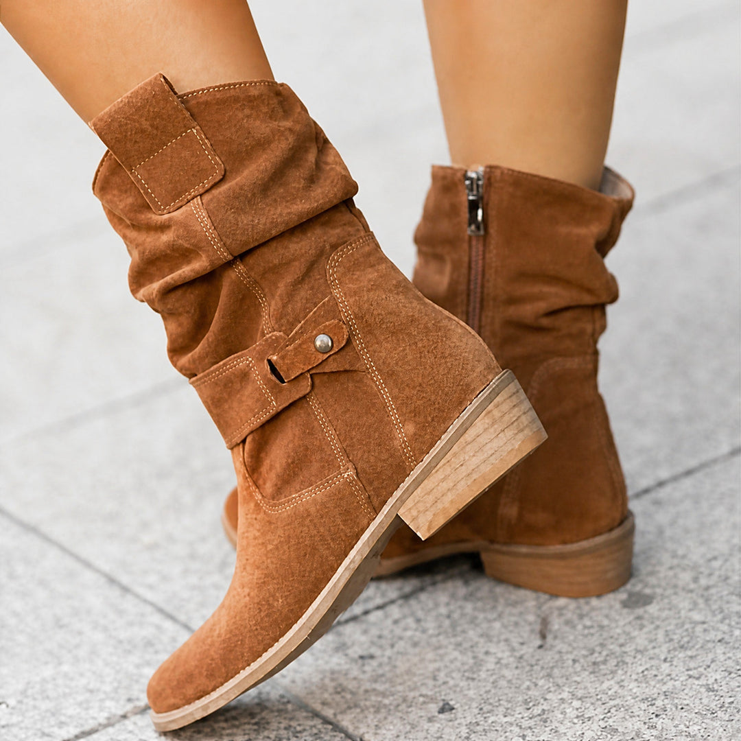 Light brown boot with stud strap and stacked heel