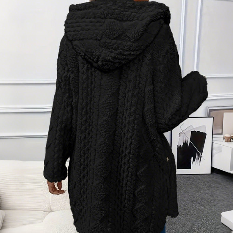 Back view of the black teddy coat with the hood lowered