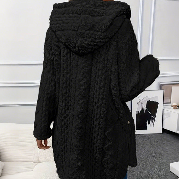 Back view of the black teddy coat with the hood lowered