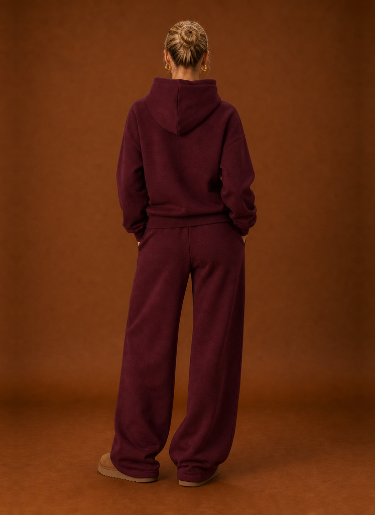 Back view of the burgundy tracksuit set with the hood down