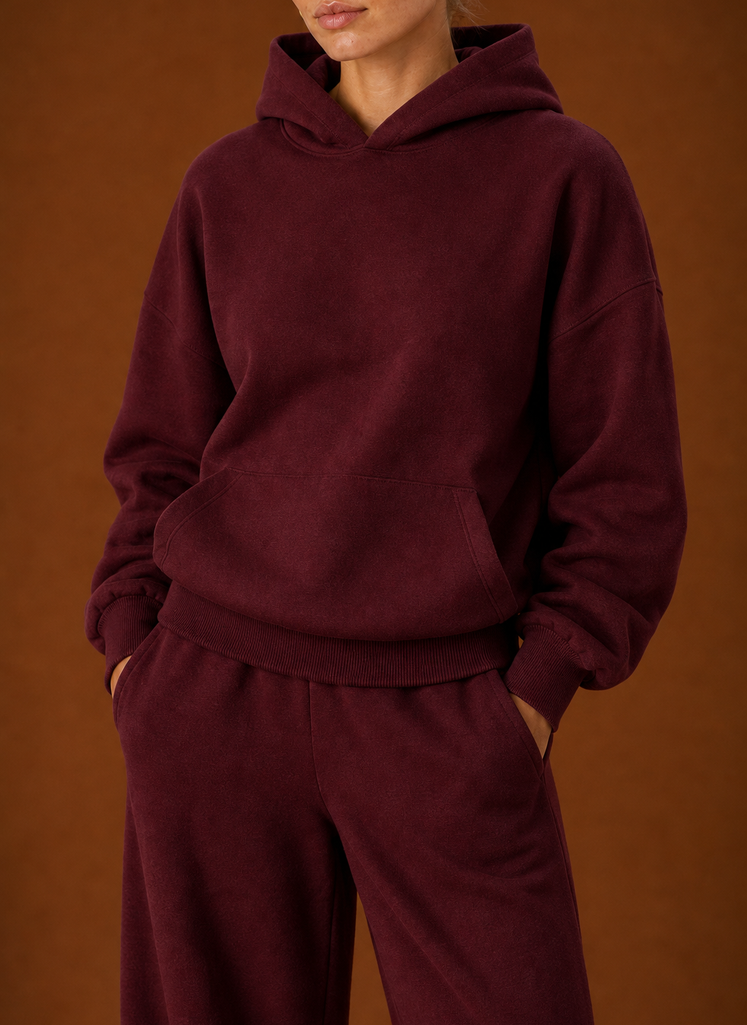 Close-up of the burgundy hoodie with kangaroo pocket