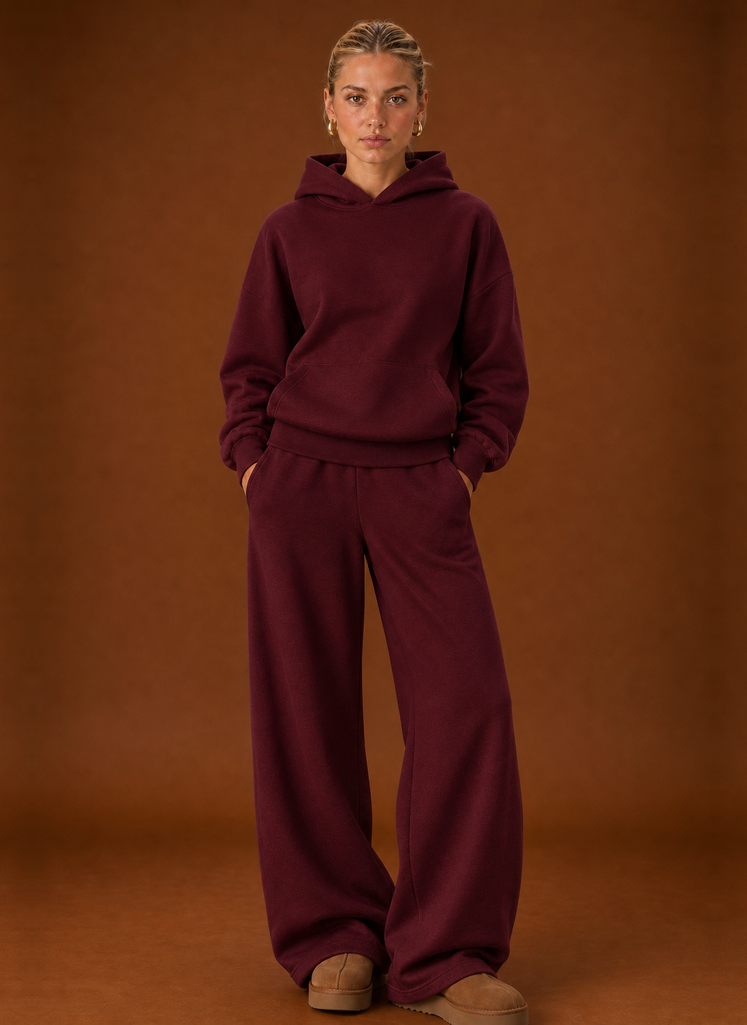 Women's tracksuit set in burgundy, oversized hoodie and wide leg joggers