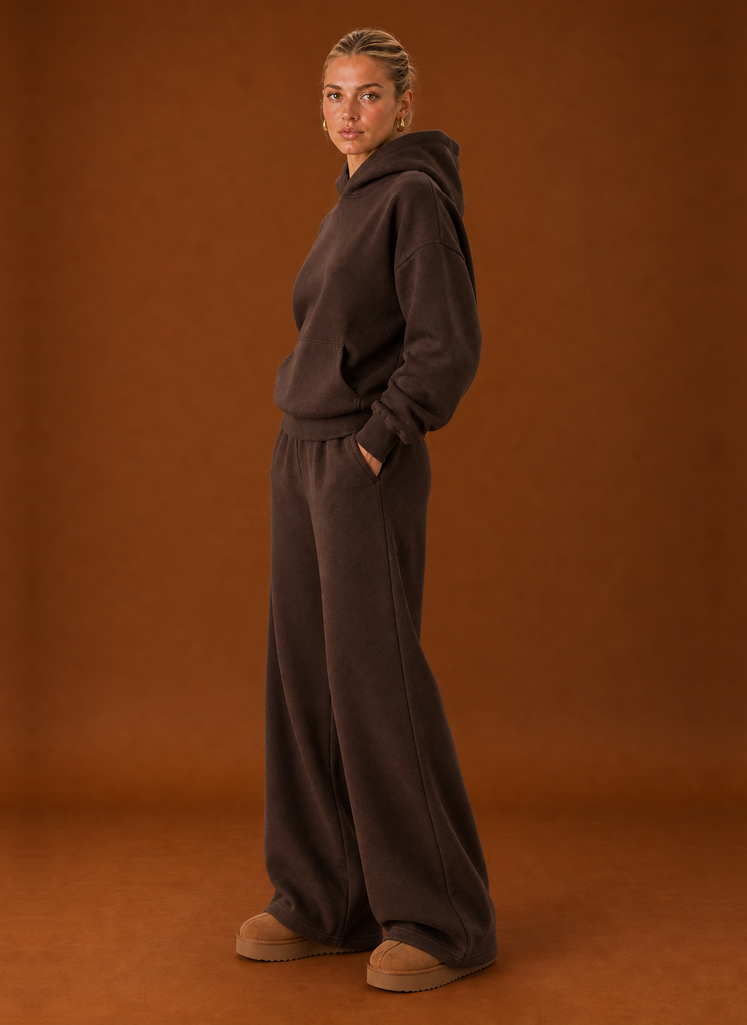 Side view of the chocolate oversized hoodie and joggers