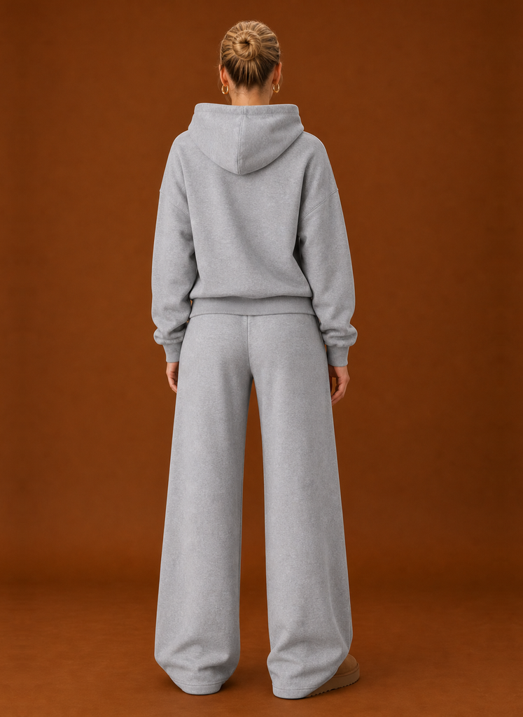 Back view of the light grey tracksuit set with the hood down