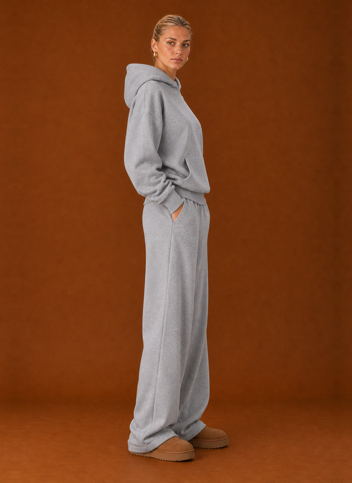Side view of the light grey oversized hoodie and joggers