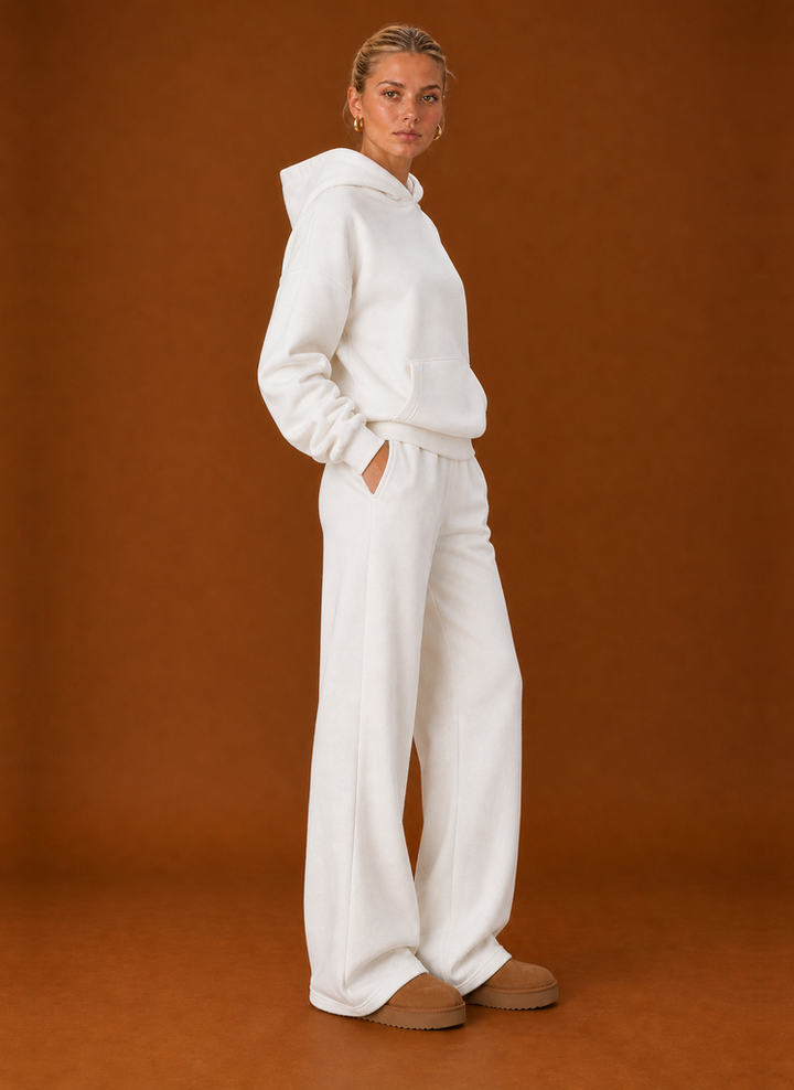 Side view of the white oversized hoodie and joggers