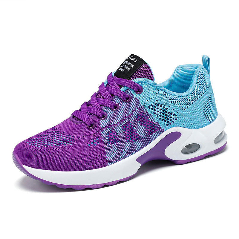 Blue Purple trainers, side view on a plain background