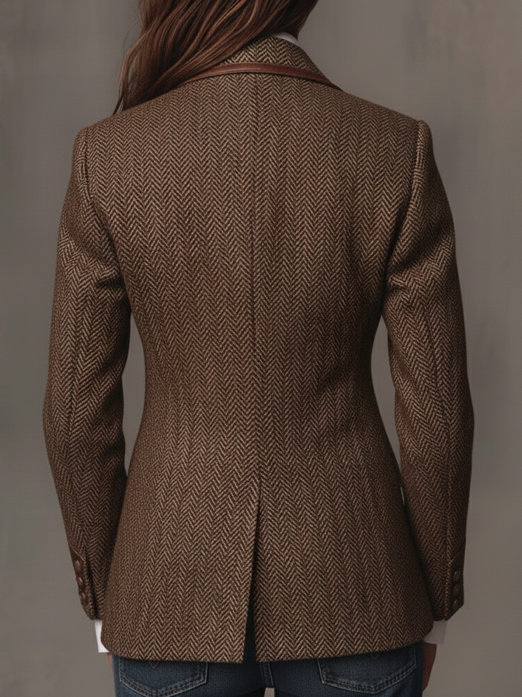 Back of the brown herringbone blazer with single vent