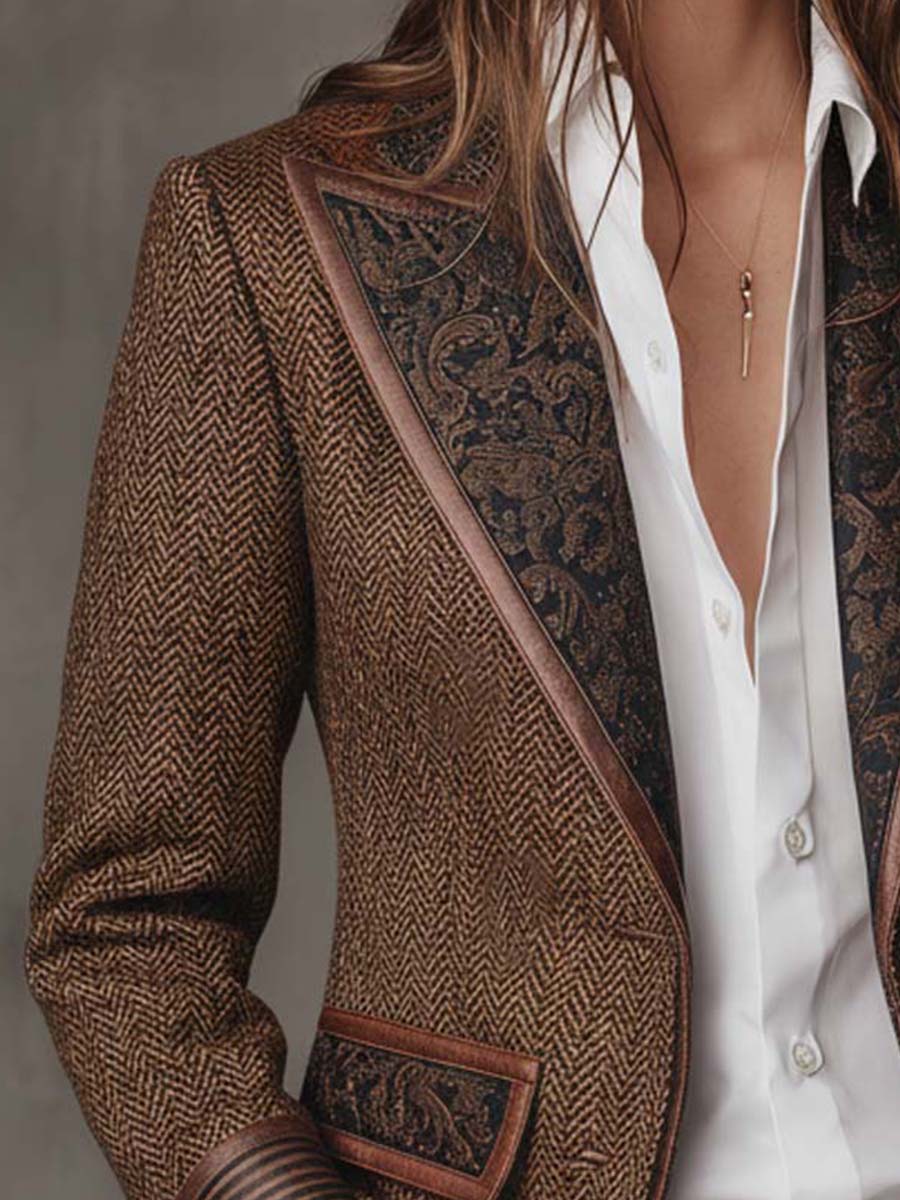 Paisley lapel panel framed with tan piping