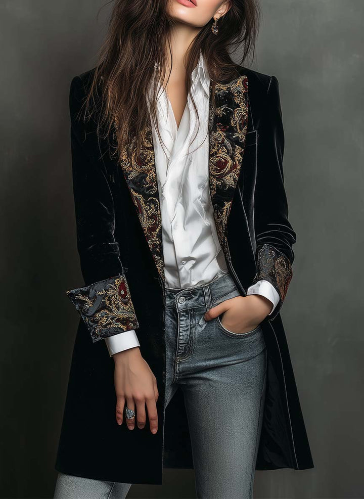 Women's velvet jacket in black, longline with red and gold paisley lapels and cuffs