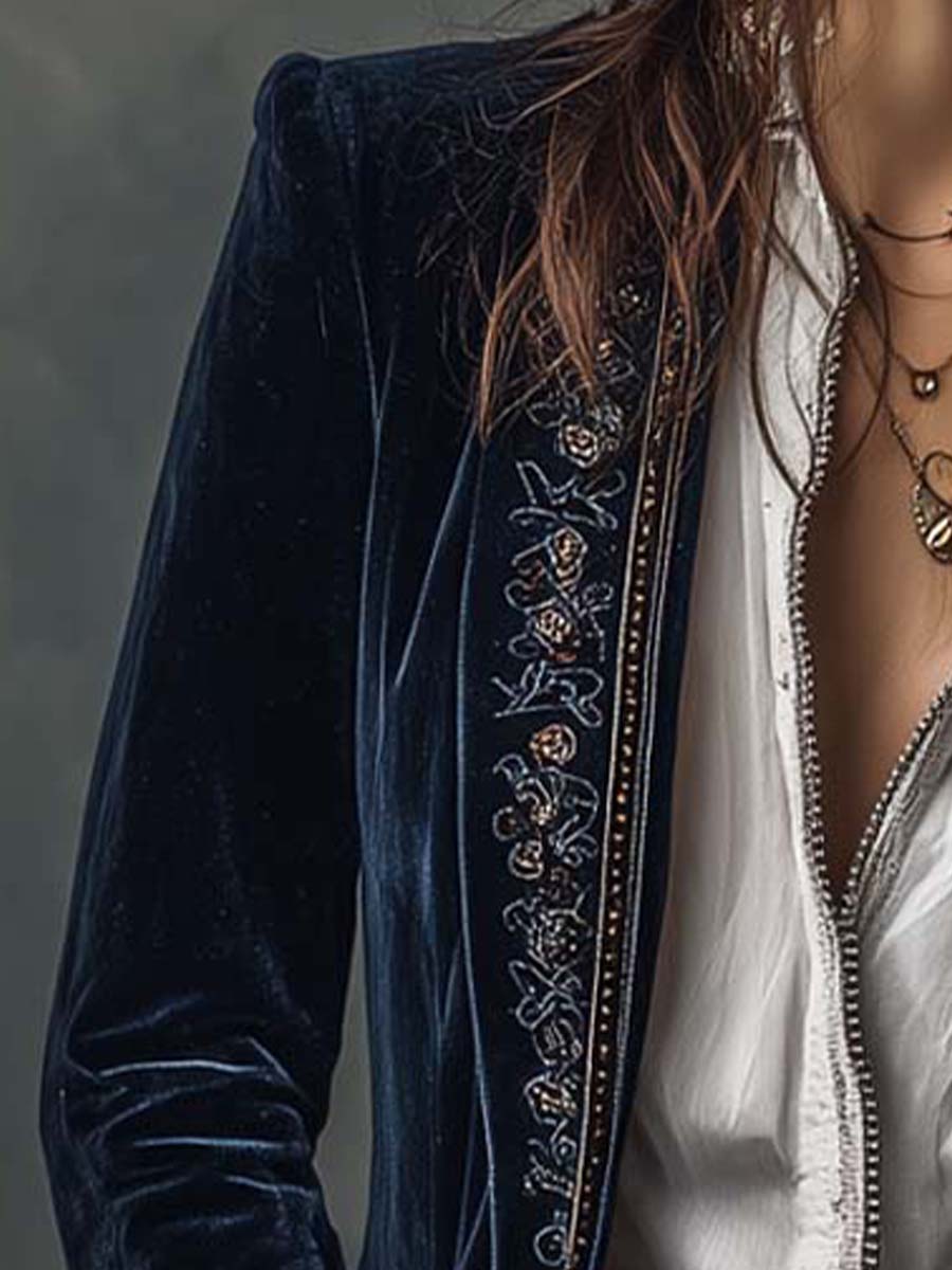 Velvet sheen on the shoulder and embroidered border