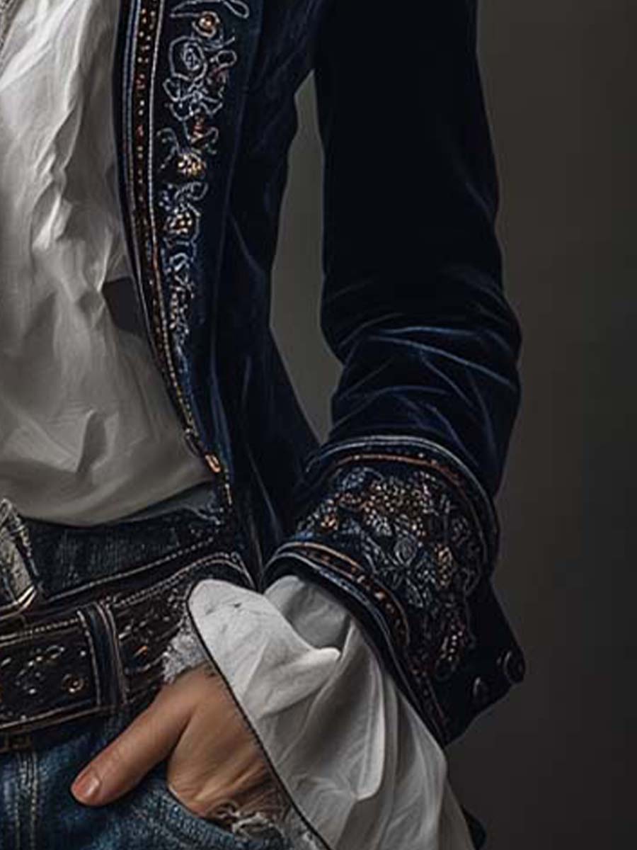 Embroidered cuff and front edge of the navy jacket