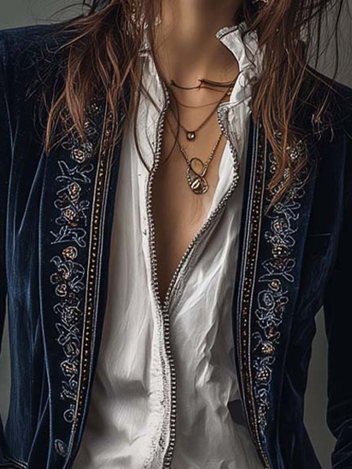 Close view of the floral embroidery along the front edge