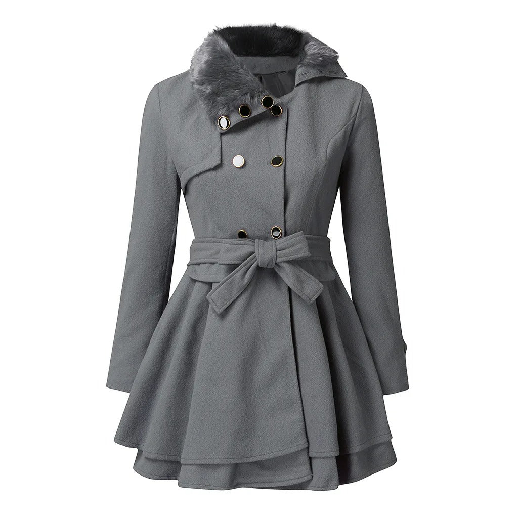 Grey trench coat with a storm flap, gold buttons and grey fur collar