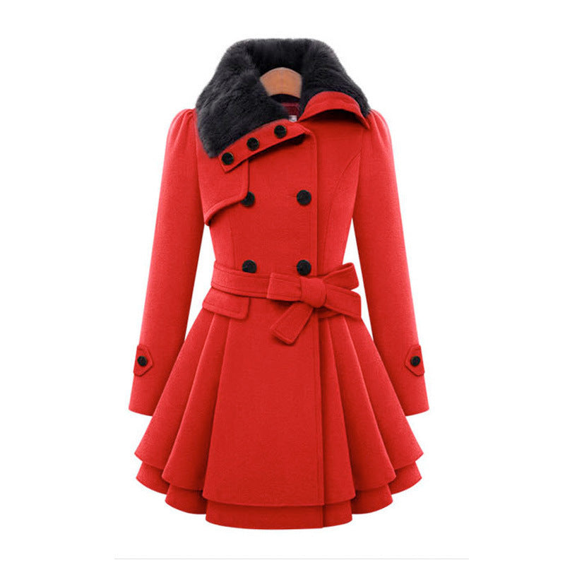 Red double breasted coat with a black faux fur collar and tie belt
