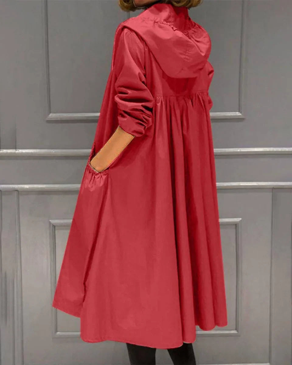 Women's long raincoat in red, hooded gathered back rain mac