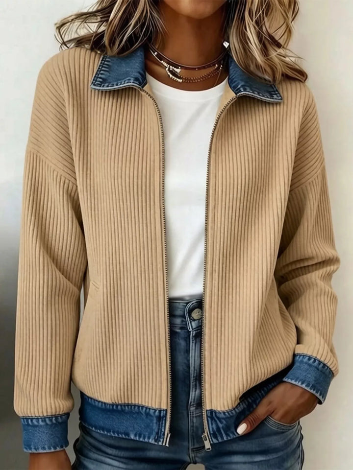Beige zip up cardigan jacket with contrast collar and cuffs, worn open